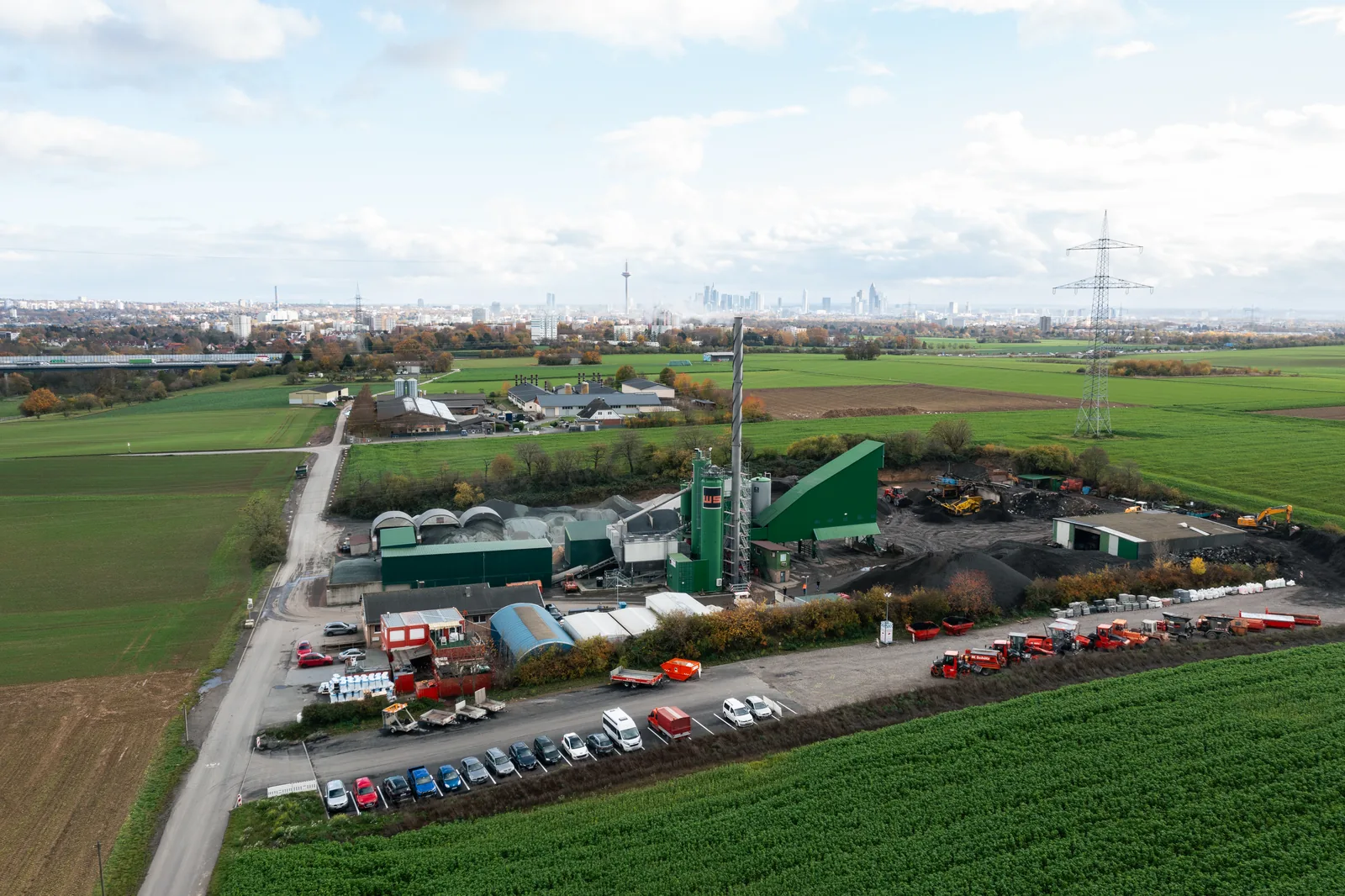 Aerial view of an asphalt production plant and material handling equipment
